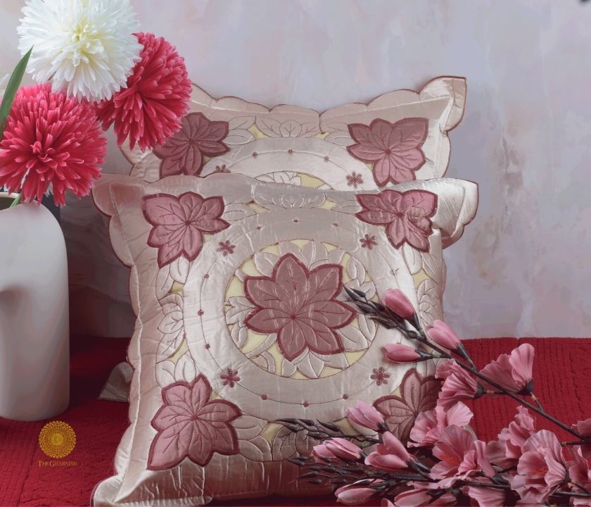 Set of two Silk Cut Work cushion covers by TheGharnish featuring intricate cut work embroidery on soft silk fabric.