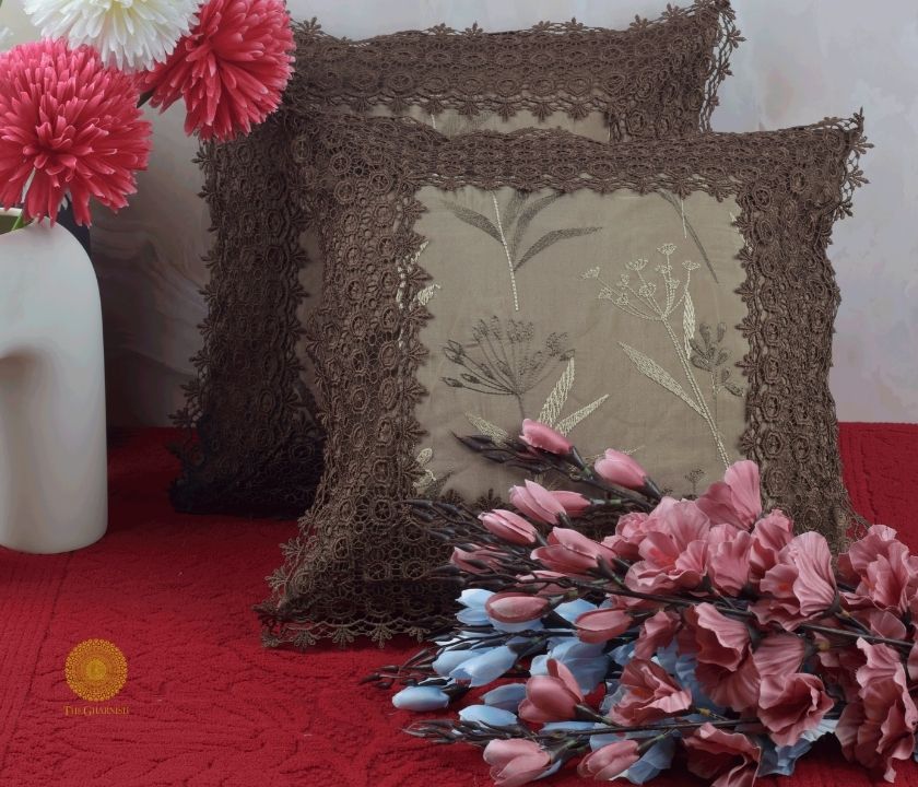 Set of two silk lace cushion covers by TheGharnish featuring elegant, soft fabric with intricate lace details.