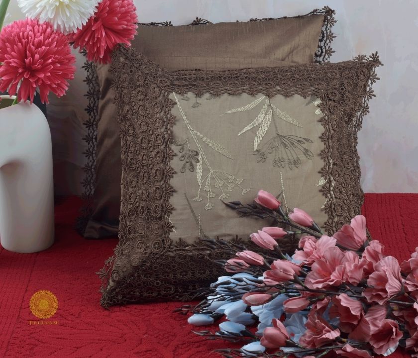 Set of two silk lace cushion covers from TheGharnish, featuring elegant lace detailing on soft, luxurious fabric.