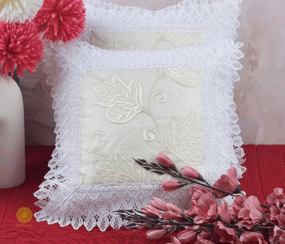 Set of two silk lace cushion covers featuring elegant design, soft fabric, and intricate lace details by TheGharnish.