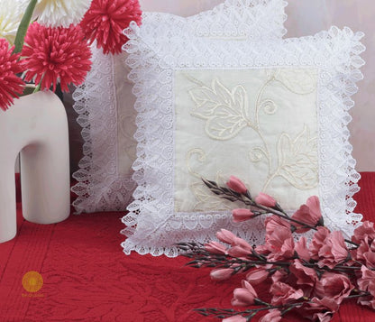 Set of two silk lace cushion covers by TheGharnish featuring elegant, soft silk fabric with delicate lace details.