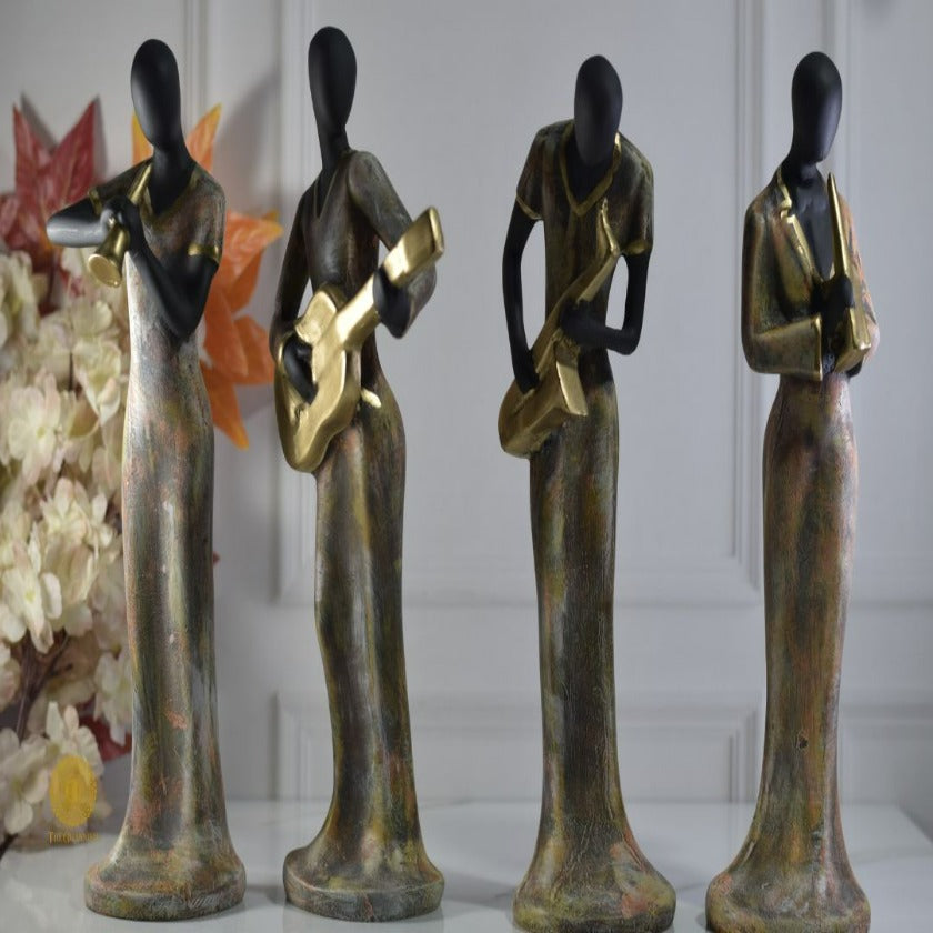 Golden Women Music Band Figurine by TheGharnish, detailed sculpture of women musicians in a golden finish, decorative collectible art piece.