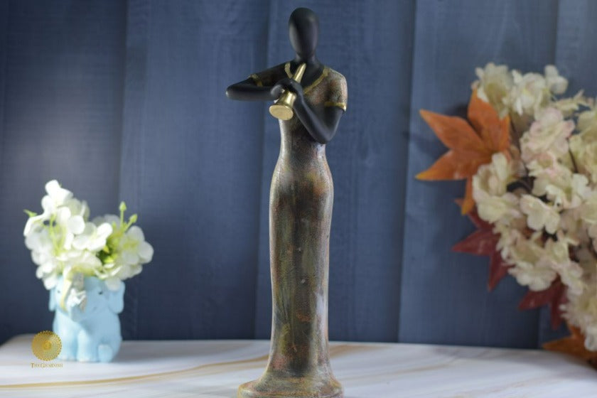 Golden Women Music Band Figurine by TheGharnish, detailed sculpture of women musicians with musical instruments, decorative figurine.