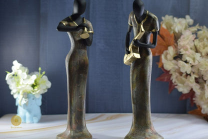 Golden women music band figurine by TheGharnish, detailed sculpture of women musicians in a stylish gold finish.