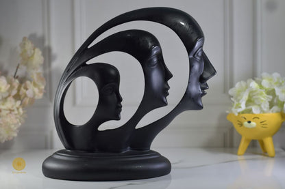 Modern Art Split Faces Figurine by TheGharnish showing a contemporary sculpture with two contrasting face profiles.