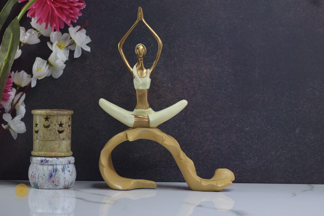 TheGharnish yoga figurine of a woman practicing yoga on a banana leaf, detailed sculpture with serene pose and natural textures.
