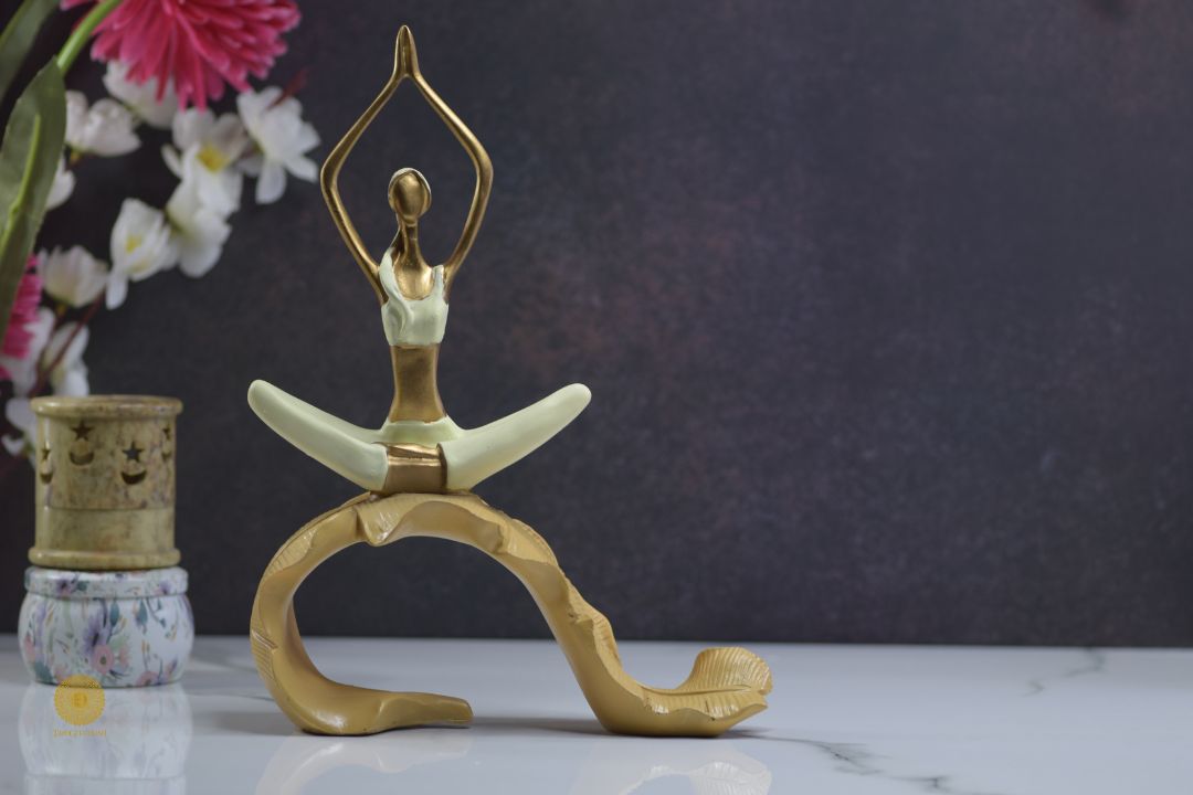 Decorative figurine of a yoga practicing lady on a banana leaf by TheGharnish, showcasing elegant craftsmanship and natural design.