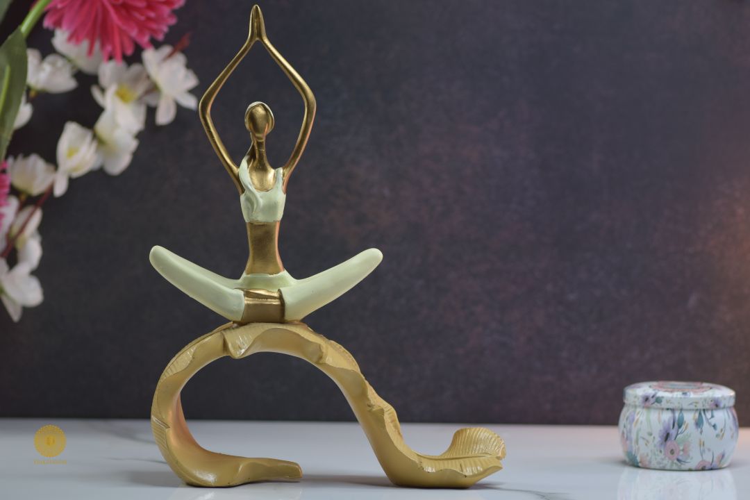 Ceramic figurine of a yoga practicing lady sitting on a banana leaf, designed by TheGharnish, showcasing peaceful meditation posture.