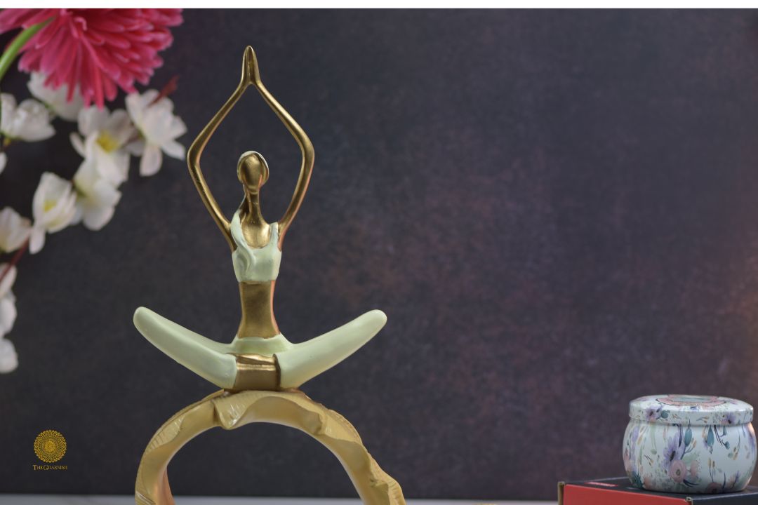 TheGharnish yoga figurine of a lady practicing yoga on a banana leaf, showcasing a peaceful meditation pose.