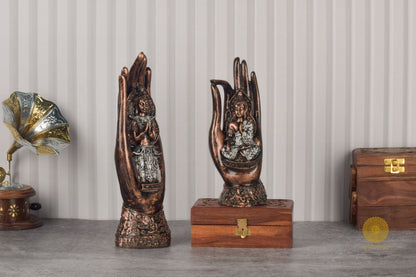 Set of two meditating Palm Buddha figurines by TheGharnish, featuring serene Buddha statues in a calming meditation pose.