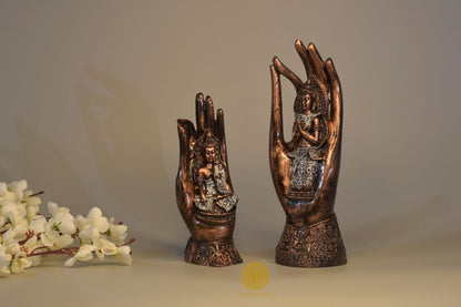 Set of two meditating Palm Buddha figurines by TheGharnish, detailed stone-like statues for meditation and spiritual decor.