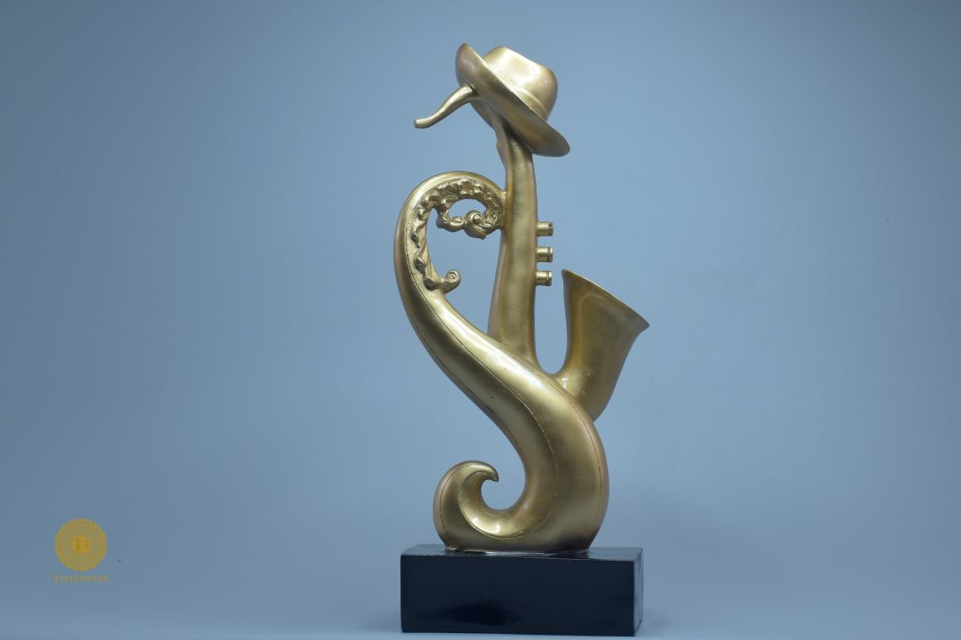 Gold-colored trumpet instrument showpiece figurine by TheGharnish, detailed decorative sculpture for display.