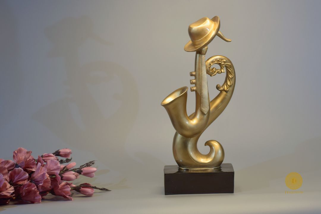 TheGharnish trumpet instrument showpiece figurine, detailed decorative sculpture of a musical trumpet instrument.