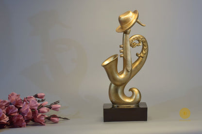 TheGharnish trumpet instrument showpiece figurine, detailed decorative sculpture of a musical trumpet instrument.