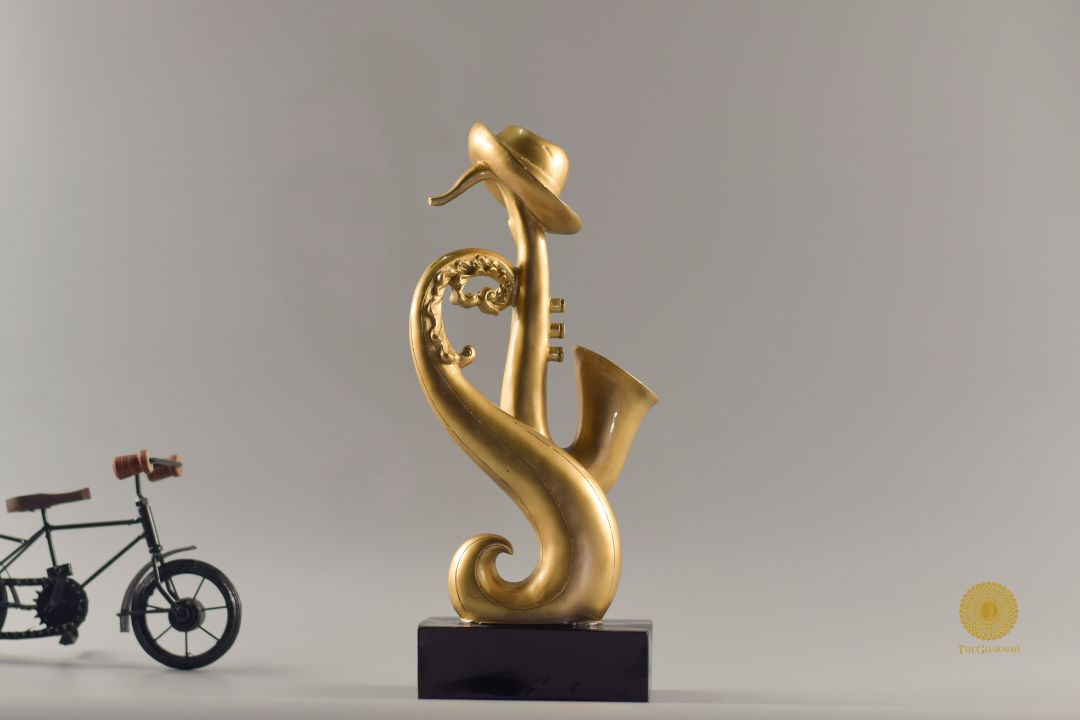 TheGharnish trumpet instrument showpiece figurine, detailed sculpture of a trumpet-themed decorative figurine on a base.