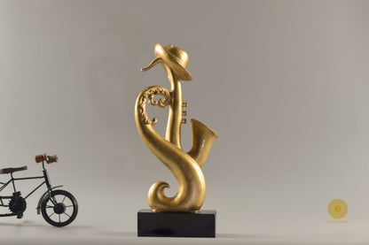 TheGharnish trumpet instrument showpiece figurine, detailed decorative sculpture of a trumpet for display or collection.