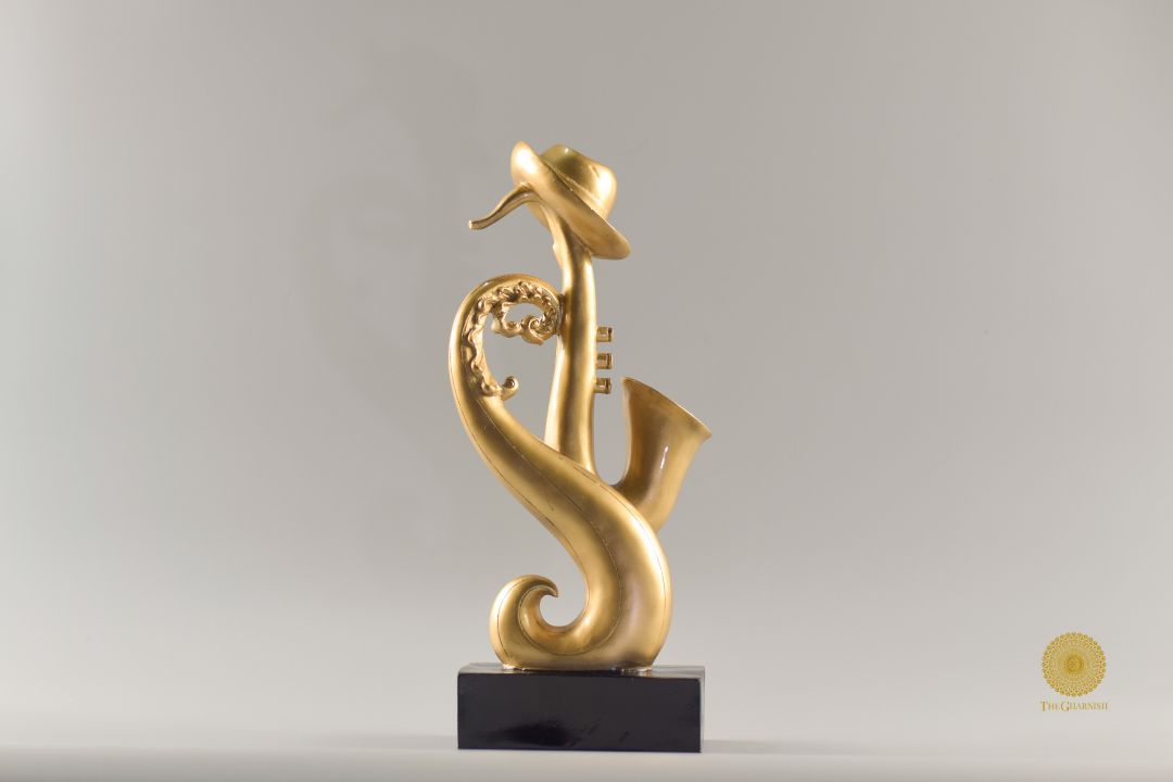 TheGharnish trumpet instrument showpiece figurine displayed on a stand, detailed and decorative for collectible or display use.
