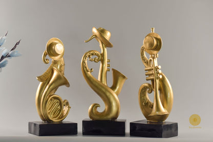 Set of three trumpet musical instrument figurines by TheGharnish, detailed decorative collectibles for music enthusiasts.
