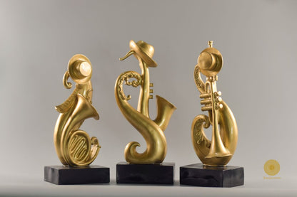 Set of three trumpet musical instrument figurines by TheGharnish, detailed miniatures for decorative display.