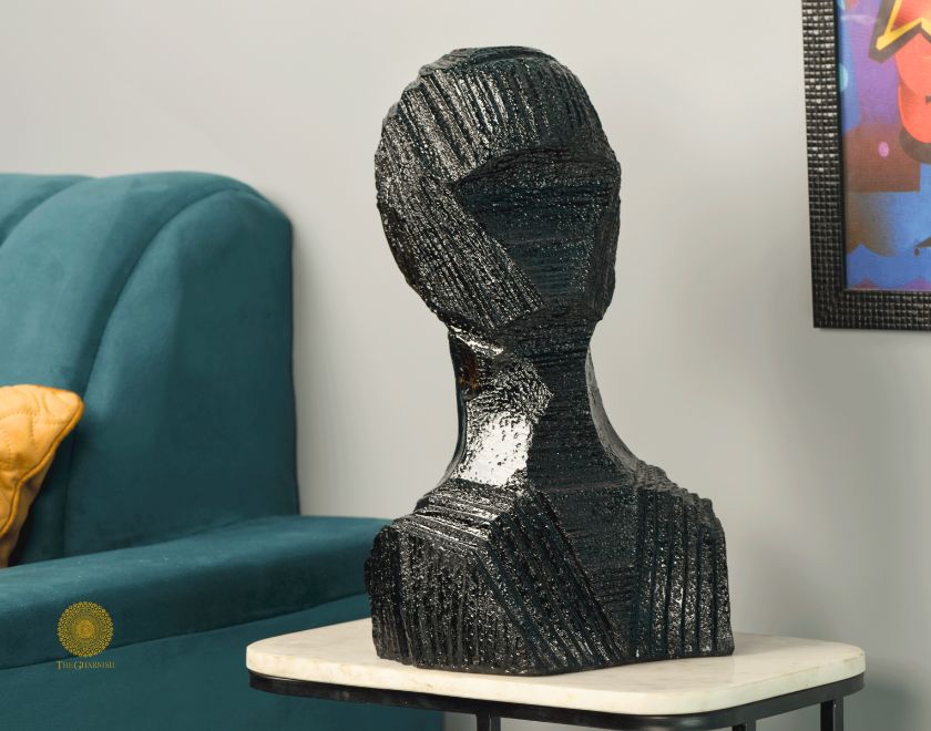 Black contemporary 3D male human figurine sculpture by TheGharnish, modern art piece with sleek, abstract design.
