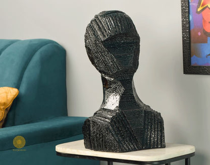 Black contemporary 3D male human figurine sculpture by TheGharnish, modern art piece with sleek, abstract design.