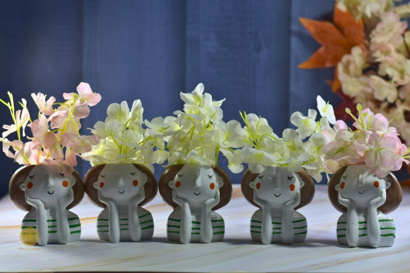 Miniature cute girl face planter by TheGharnish, featuring a charming face design and small size perfect for indoor decor.