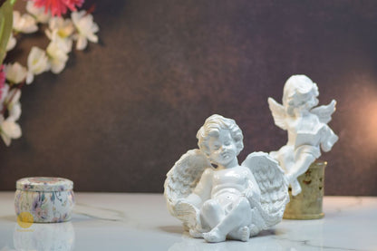 Miniature Sleeping Angel Figurine by TheGharnish, featuring a peaceful angel with closed eyes and delicate wings.
