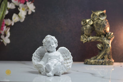 Miniature Sleeping Angel Figurine by TheGharnish, featuring a peaceful angel with closed eyes and delicate wings.