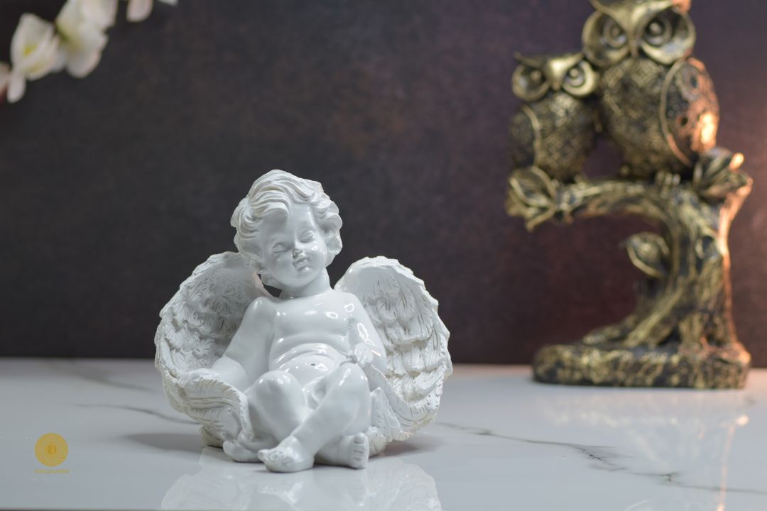 Miniature Sleeping Angel Figurine by TheGharnish, detailed white angel with closed eyes and delicate wings, resting peacefully.