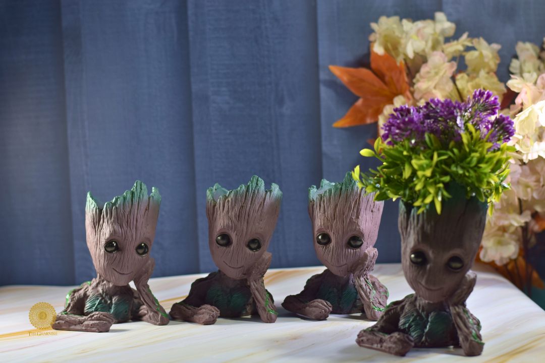 Thoughtful Groot miniature figure from TheGharnish, showing Groot with a gentle, contemplative expression and detailed tree-like features.