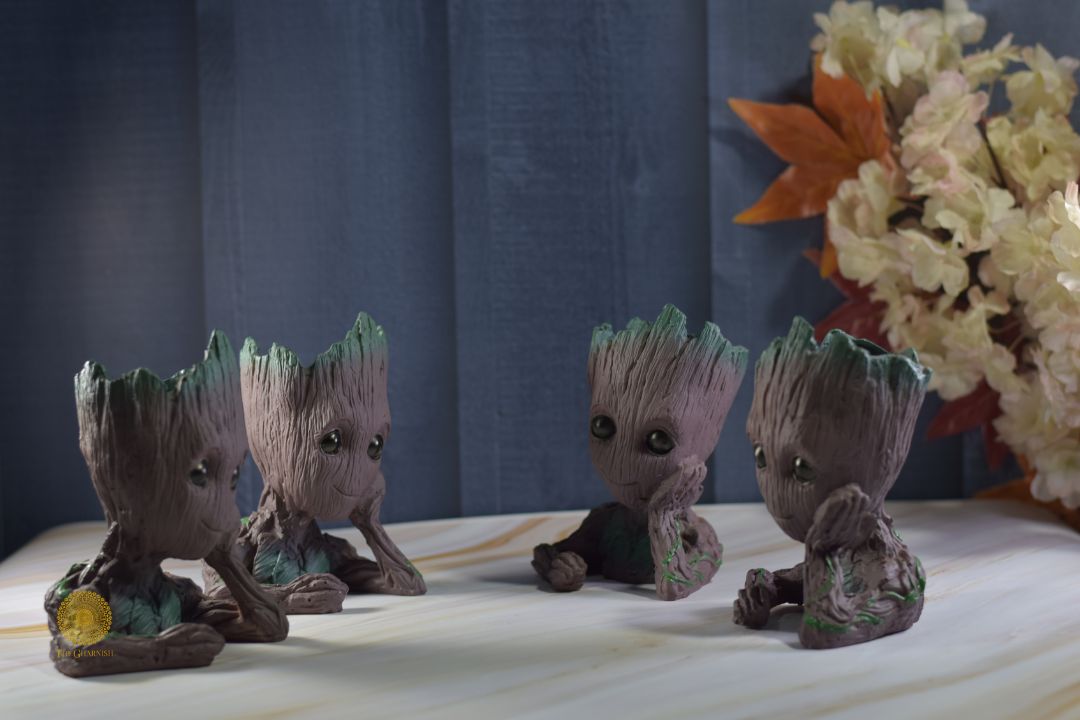 Thoughtful Groot miniature figure by TheGharnish, showing Groot with a contemplative expression and detailed sculpting.