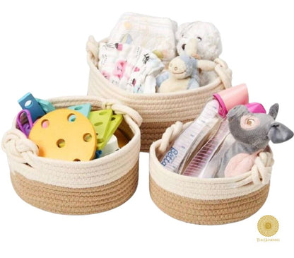 Set of three stylish brown and white decorative storage organizer baskets by TheGharnish for home organization.