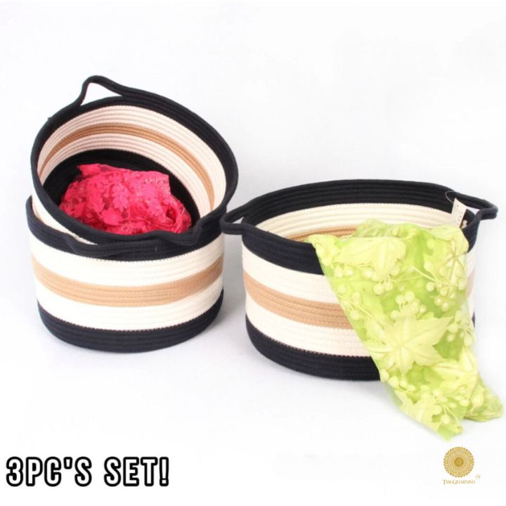 Set of three TheGharnish cotton rope storage baskets in vibrant colors, ideal for organizing and decor.