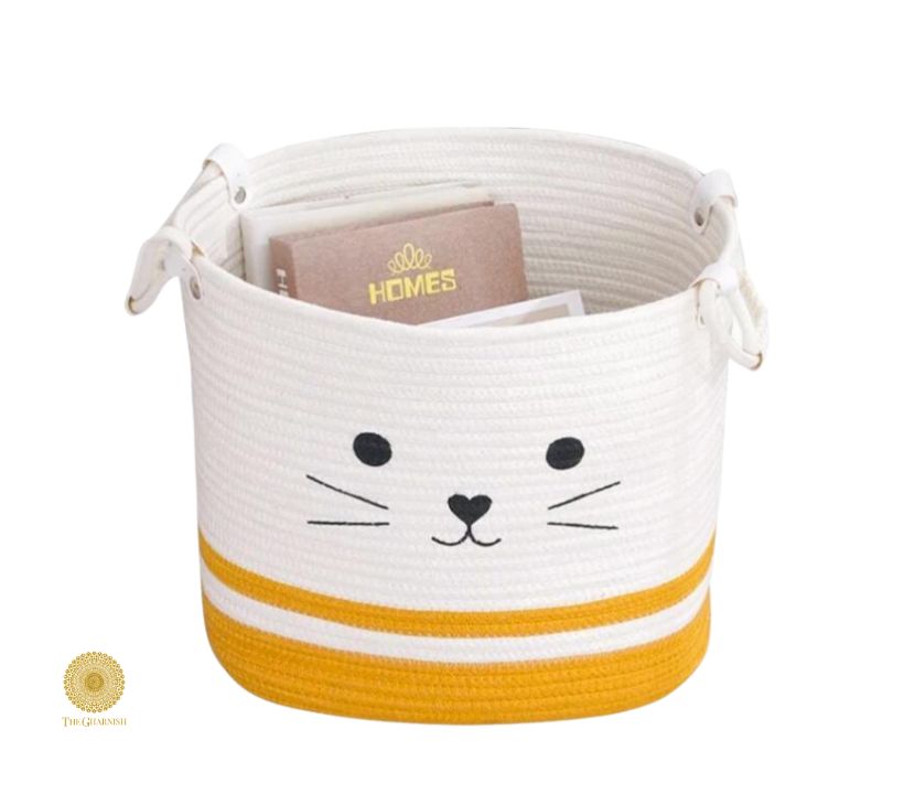 Yellow cat embroidered storage basket by TheGharnish, ideal for laundry or organization, with a charming feline design.