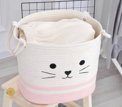 Yellow cat-embroidered storage basket by TheGharnish, versatile laundry or storage container with decorative embroidery.