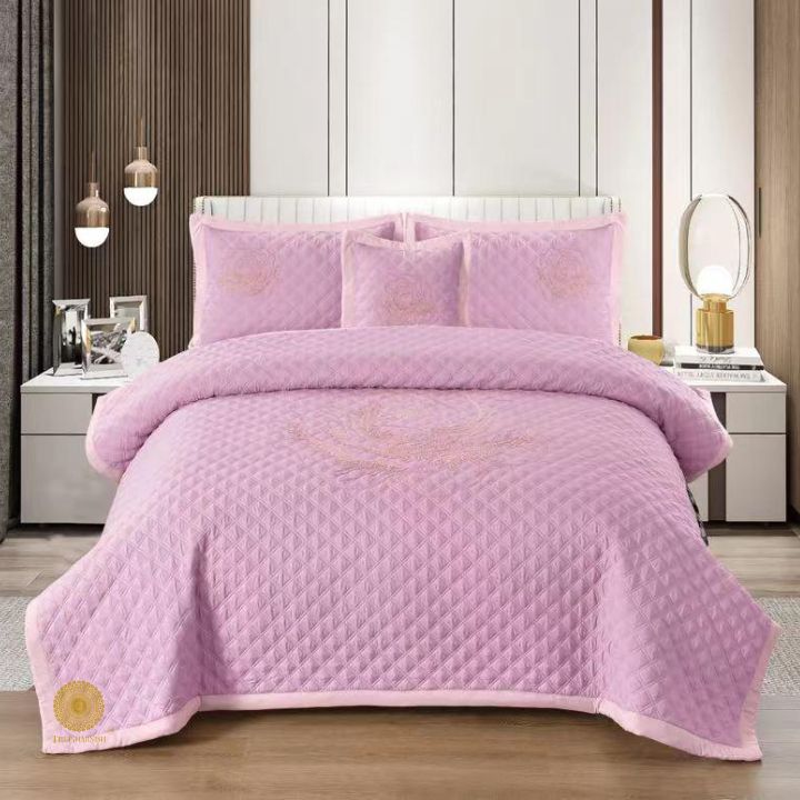 TheGharnish Paradise solid color quilted bedcover with heavy embroidery, showcasing intricate stitching and elegant design.