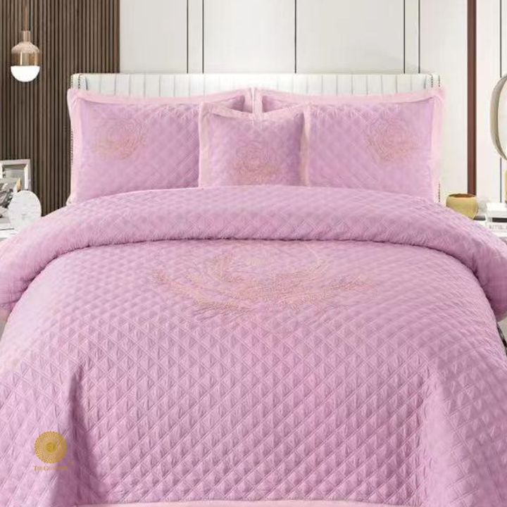 TheGharnish Paradise solid color quilted bedcover with heavy embroidery, showcasing intricate stitching and plush fabric for a luxurious look.
