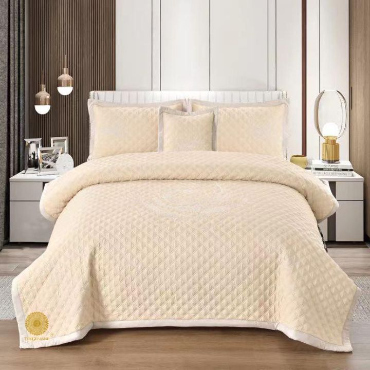 TheGharnish Paradise solid color quilted bedcover with heavy embroidery, showcasing intricate stitching and a plush, textured design.