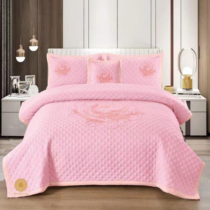 TheGharnish Paradise solid color quilted bedcover with heavy embroidery, showcasing intricate stitching and plush fabric for a luxurious bedroom look.