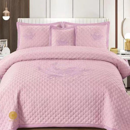 TheGharnish Paradise solid color quilted bedcover with heavy embroidery, showcasing intricate stitching and plush fabric.