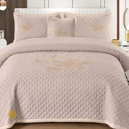 TheGharnish Paradise solid color quilted bedcover with heavy embroidery, showcasing intricate stitched patterns on soft fabric.