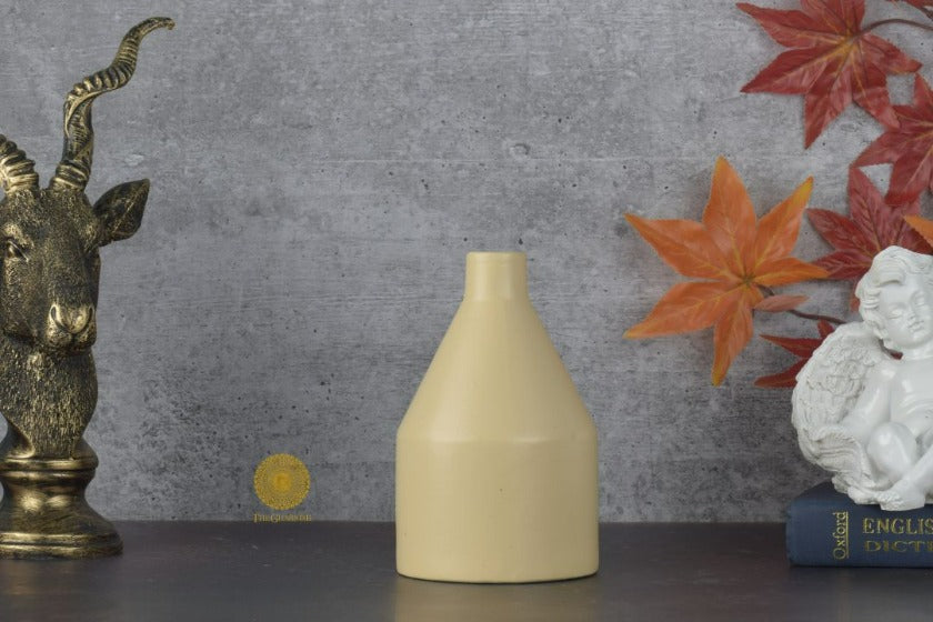 Contemporary ceramic flower vase by TheGharnish with a sleek, modern design and smooth finish for stylish home decor.