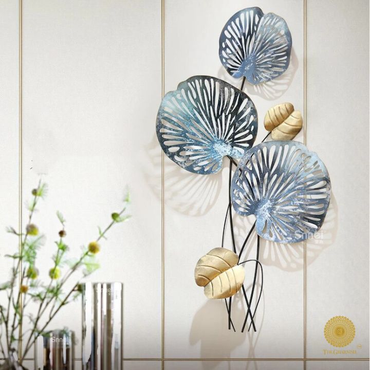 Metallic lotus leaf wall art by TheGharnish, 18x36 inches, featuring detailed, shiny leaf designs for modern home decor.