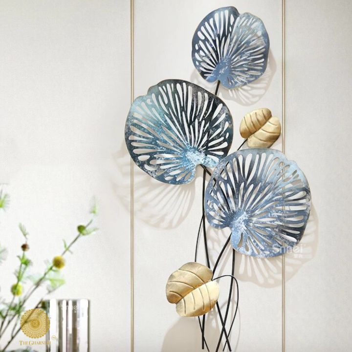 Metallic lotus leaf wall art by TheGharnish, 18 x 36 inches, featuring elegant, shiny leaf designs for modern home decor.
