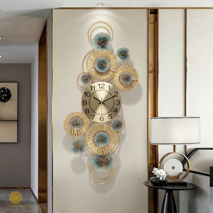 Metallic wall clock with 10 ring plates, 18x48 inches, modern design by TheGharnish, featuring a sleek and contemporary style.