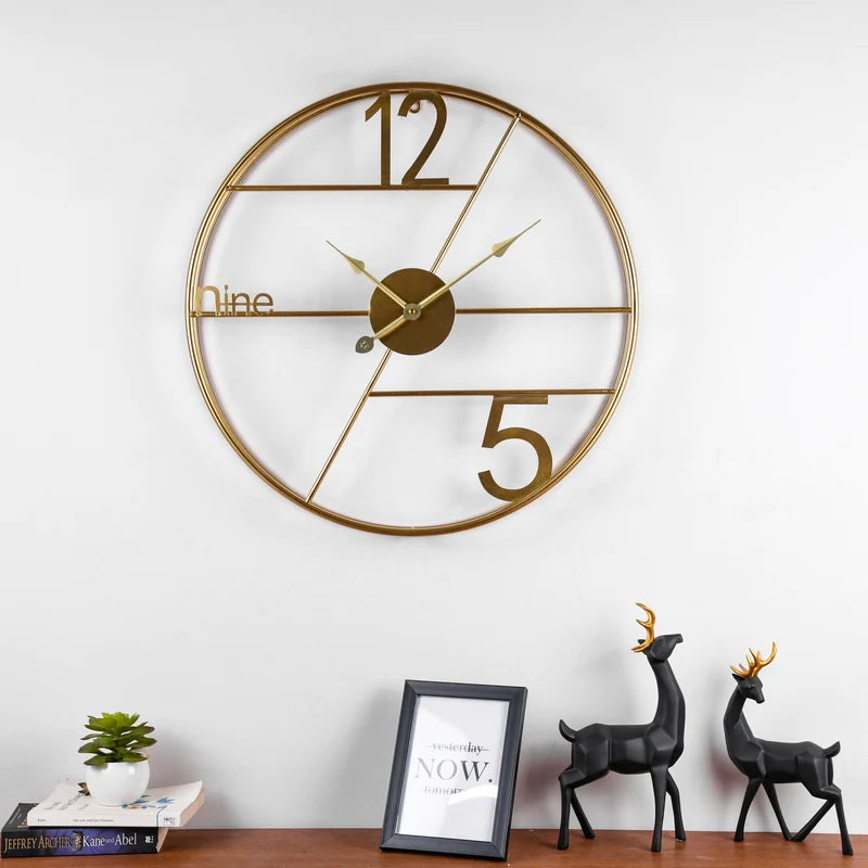 Alpha Numeric Metallic Wall Clock by TheGharnish, 24-inch diameter, modern design with bold numbers for stylish wall decor.