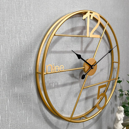 Metallic wall clock with alpha-numeric design, 24-inch diameter, by TheGharnish, showcasing modern wall clock style