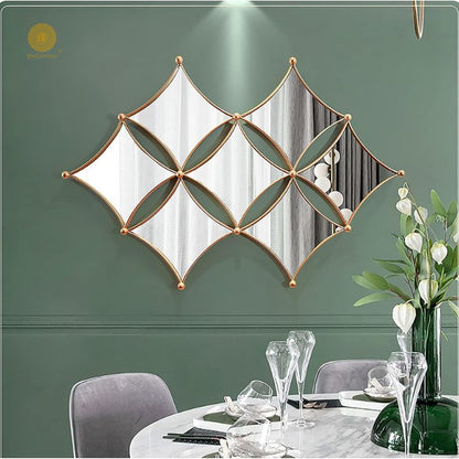 Curved rhombus metallic wall mirror by TheGharnish, 36 x 22 inches, with a sleek modern design for stylish interior decor.