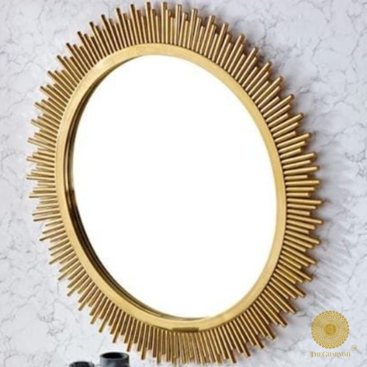 Golden Pipe Sticks metallic wall mirror by TheGharnish, 32-inch diameter, with a modern gold finish and decorative pipe frame.