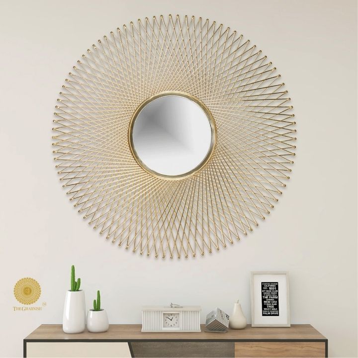 Metallic sticks wall mirror by TheGharnish, 30-inch diameter decorative wall mirror with a modern metallic frame.